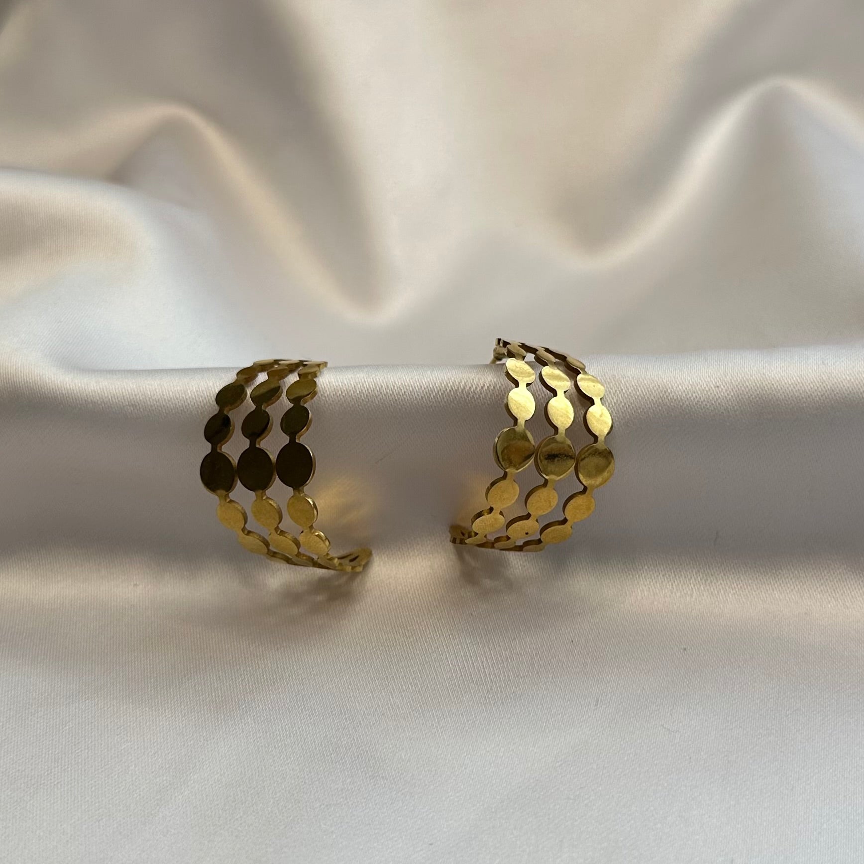 Brincos com bolinhas