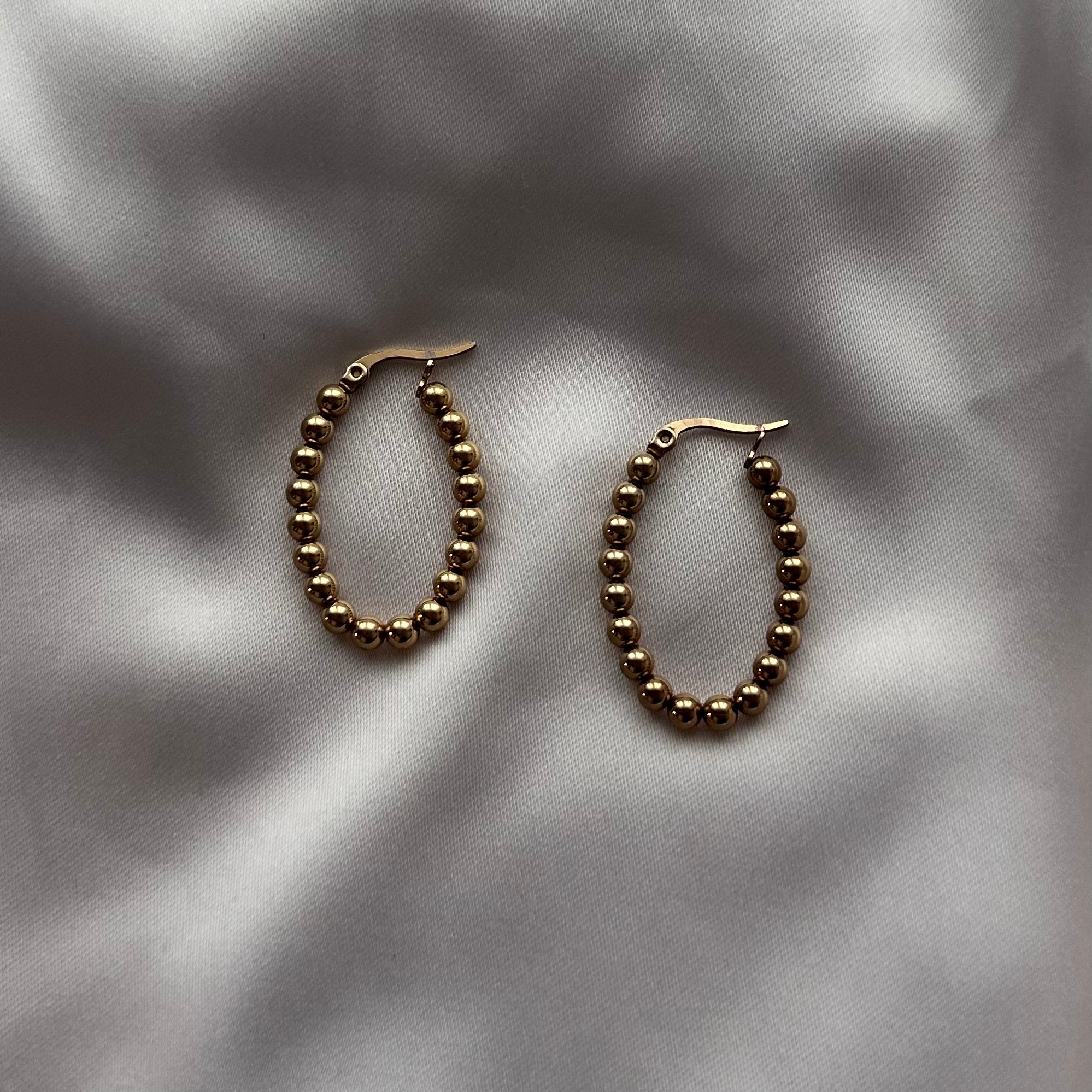 Brincos com bolinhas