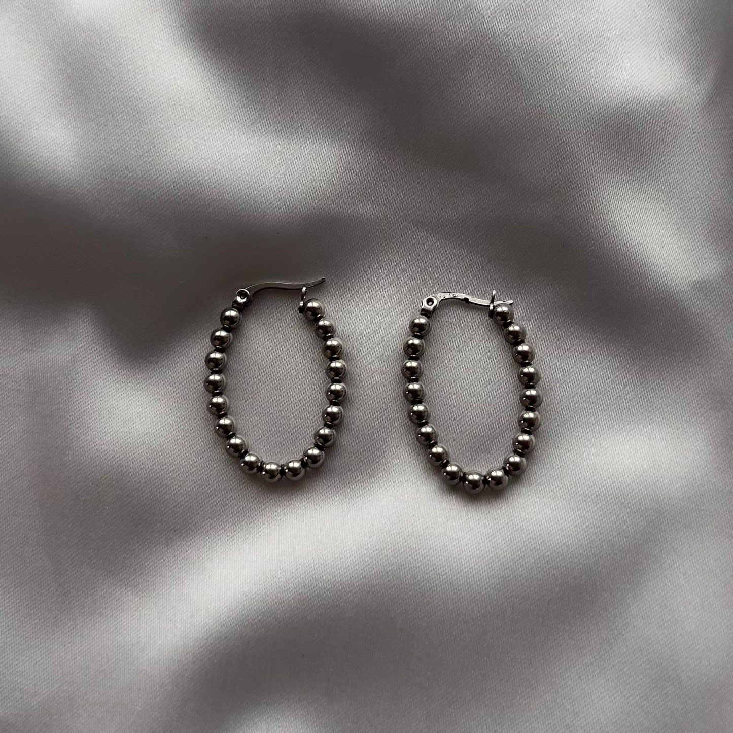 Brincos com bolinhas