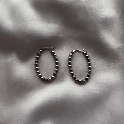 Brincos com bolinhas